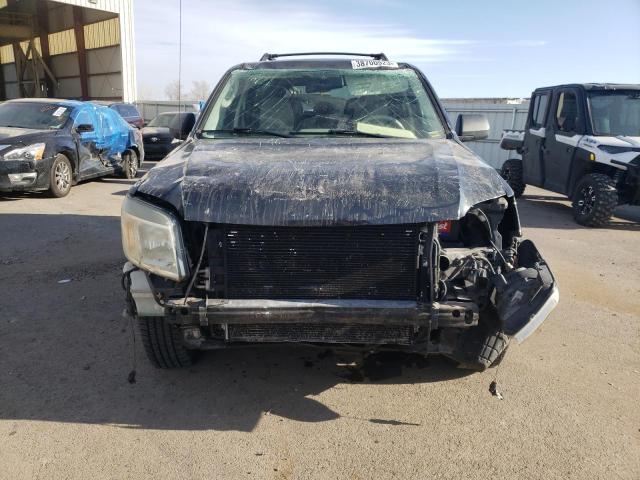 Photo 5 from auction – 2009 MERCURY MARINER with VIN 4M2CU81789KJ07563