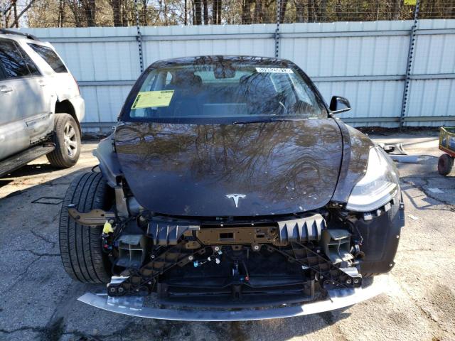 Photo 5 from auction – 2022 TESLA MODEL 3 with VIN 5YJ3E1EB4NF287009