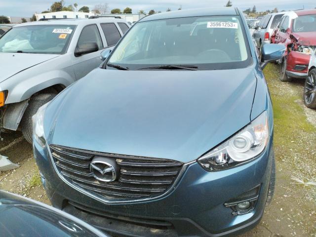 Photo 5 from auction – 2016 MAZDA CX-5 TOURI with VIN JM3KE2CY5G0654890
