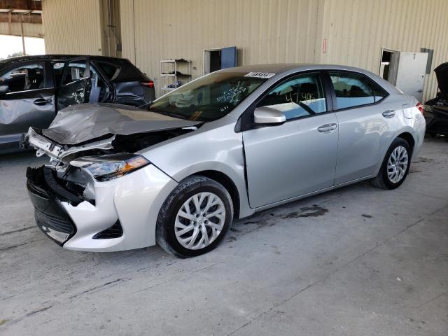TOYOTA COROLLA L 2019 with VIN 5YFBURHE0KP859356 - Photo from auction