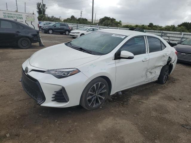 TOYOTA COROLLA L 2019 with VIN 5YFBURHE7KP874422 - Photo from auction