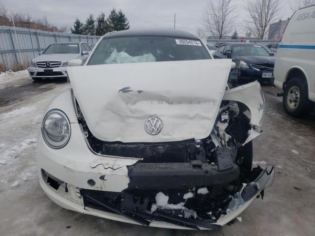 Photo 5 from auction – 2012 VOLKSWAGEN BEETLE with VIN 3VWJX7AT9CM624007