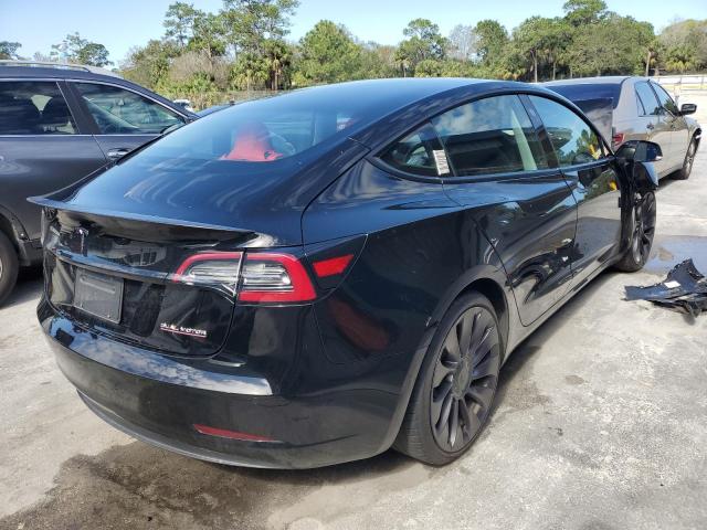 Photo 3 from auction – 2021 TESLA MODEL 3 with VIN 5YJ3E1EC7MF856216