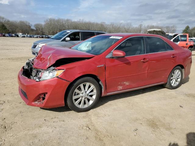TOYOTA CAMRY HYBR 2014 with VIN 4T1BD1FK8EU126307 - Photo from auction