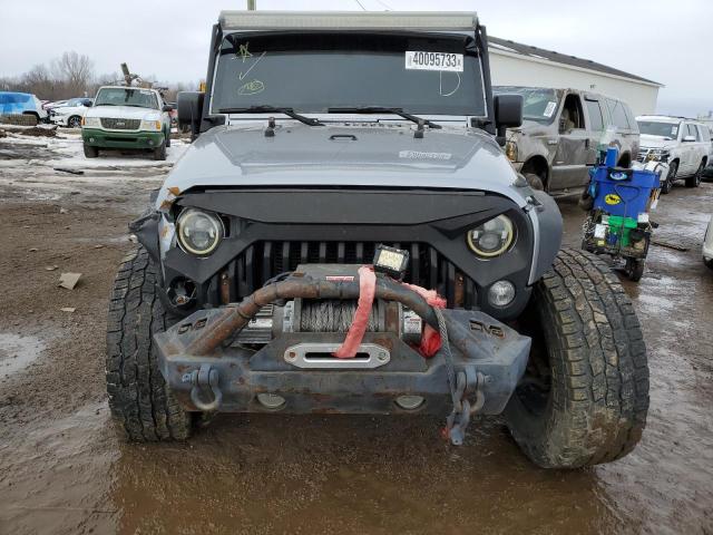 Photo 5 from auction – 2014 JEEP WRANGLER U with VIN 1C4HJWDG7EL144404