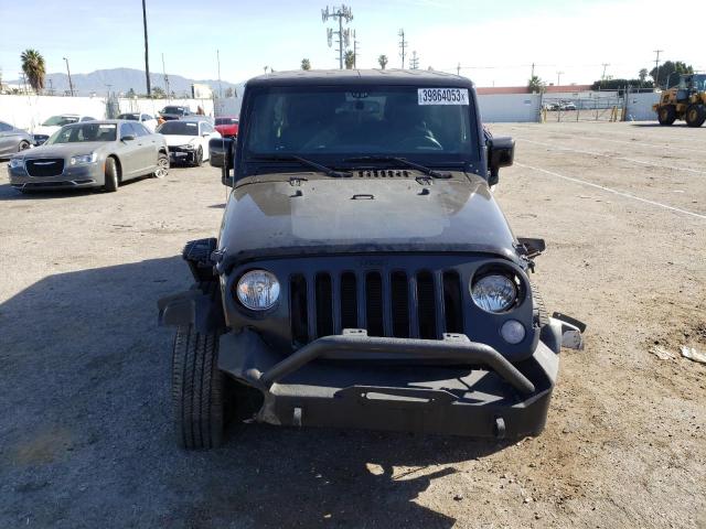 Photo 5 from auction – 2014 JEEP WRANGLER U with VIN 1C4BJWEG7EL254857
