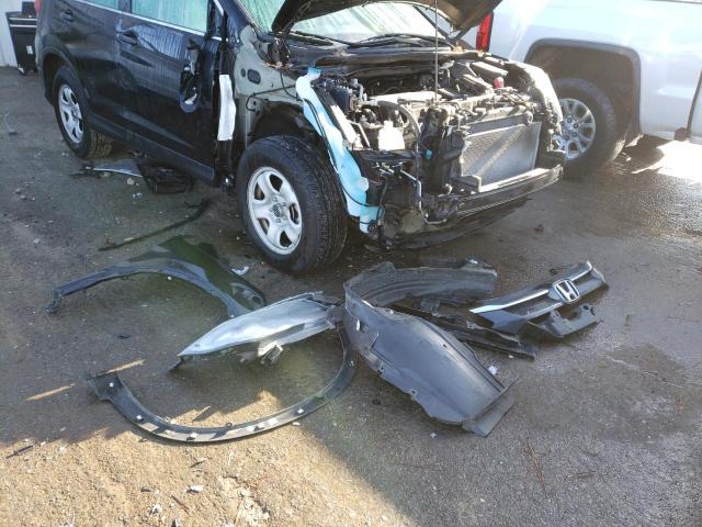 Photo 13 from auction – 2016 HONDA CR-V LX with VIN 2HKRM3H37GH557271