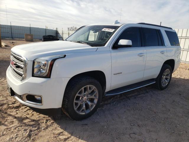 GMC YUKON SLT 2017 with VIN 1GKS2BKC8HR343897 - Photo from auction