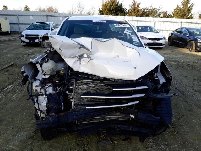 Photo 5 from auction – 2018 HYUNDAI TUCSON SE with VIN KM8J2CA47JU791053