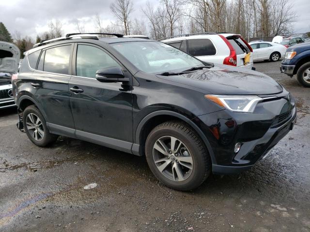 Photo 4 from auction – 2016 TOYOTA RAV4 XLE with VIN 2T3RFREV3GW468163