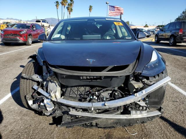 Photo 5 from auction – 2022 TESLA MODEL 3 with VIN 5YJ3E1EA9NF142720