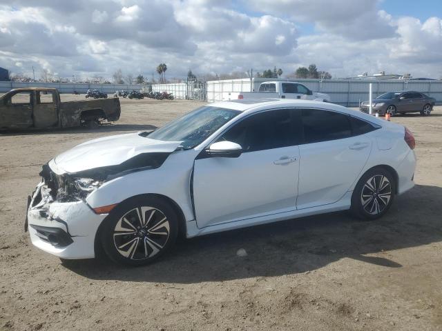 HONDA CIVIC EXL 2017 with VIN 19XFC1F75HE212858 - Photo from auction