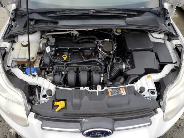 Photo 11 from auction – 2014 FORD FOCUS SE with VIN 1FADP3F22EL324781