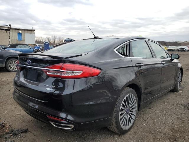 Photo 3 from auction – 2018 FORD FUSION TIT with VIN 3FA6P0D95JR188228