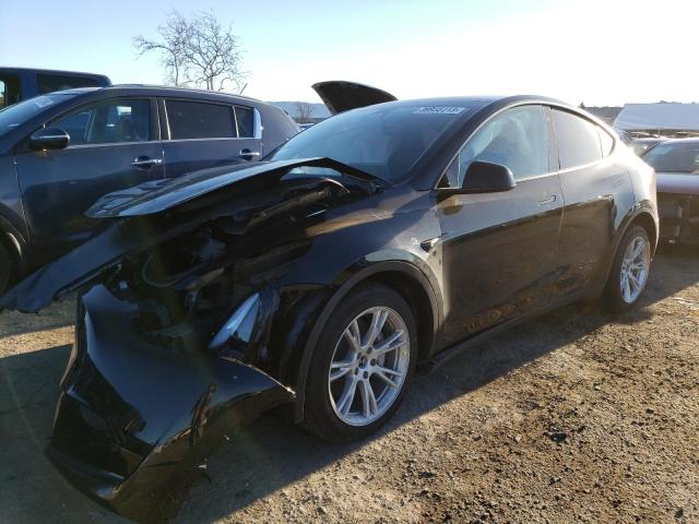 TESLA MODEL Y 2023 with VIN 7SAYGAEE2PF605015 - Photo from auction