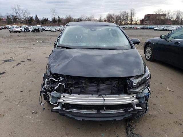 Photo 5 from auction – 2022 TOYOTA PRIUS PRIM with VIN JTDKAMFP0N3216664