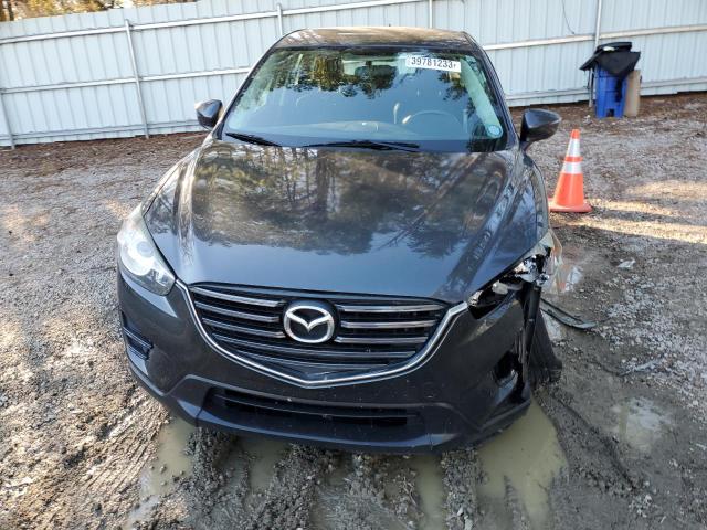 Photo 5 from auction – 2016 MAZDA CX-5 SPORT with VIN JM3KE2BY1G0791973