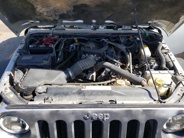 Photo 11 from auction – 2011 JEEP WRANGLER U with VIN 1J4BA5H15BL522361