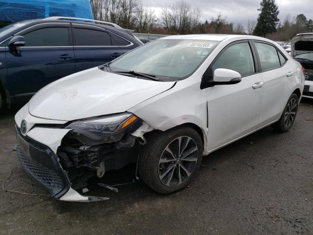 TOYOTA COROLLA L 2017 with VIN 5YFBURHE0HP673020 - Photo from auction