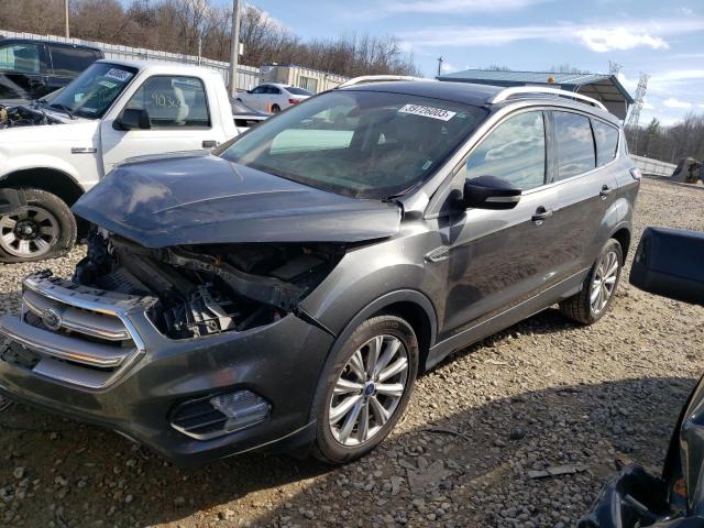 FORD ESCAPE TIT 2017 with VIN 1FMCU0J99HUC56197 - Photo from auction