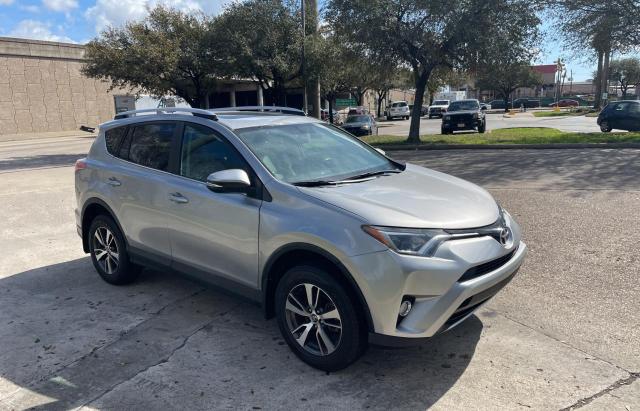 TOYOTA RAV4 XLE 2016 with VIN 2T3WFREV0GW239801 - Photo from auction