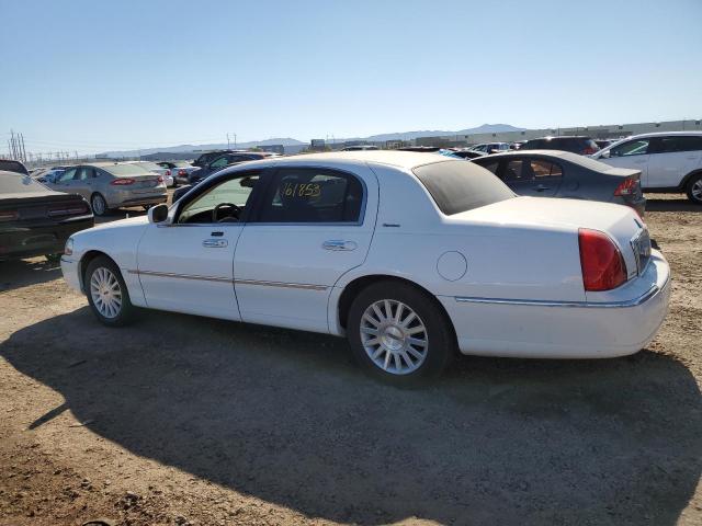 Photo 2 from auction – 2003 LINCOLN TOWN CAR with VIN 1LNHM82W23Y653468