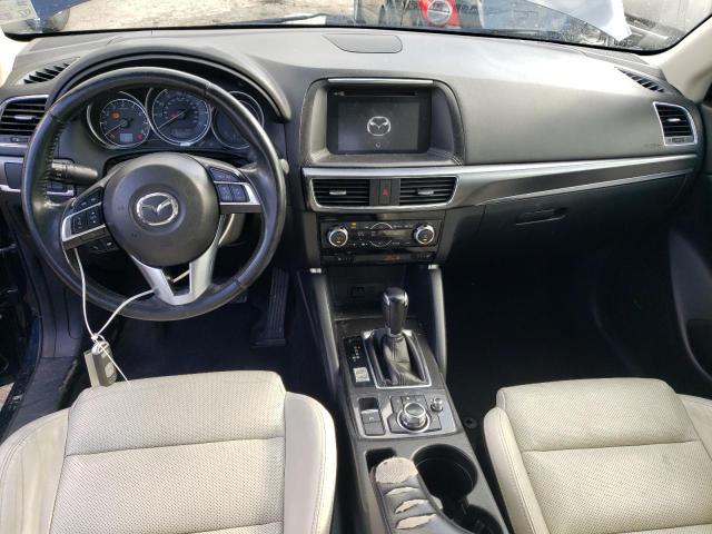 Photo 8 from auction – 2016 MAZDA CX-5 GT with VIN JM3KE2DY6G0656159