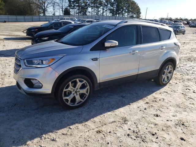 FORD ESCAPE TIT 2018 with VIN 1FMCU0J92JUB81848 - Photo from auction