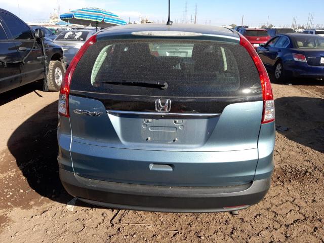 Photo 6 from auction – 2014 HONDA CR-V LX with VIN 2HKRM3H33EH560357