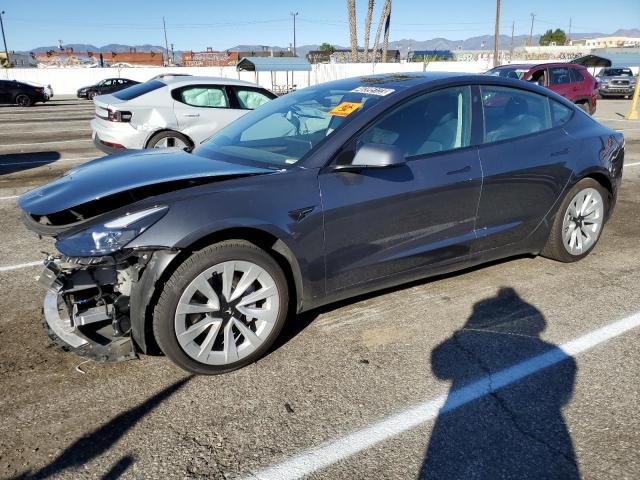 TESLA MODEL 3 2022 with VIN 5YJ3E1EA9NF142720 - Photo from auction