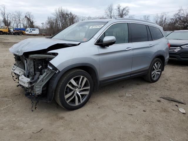 HONDA PILOT TOUR 2016 with VIN 5FNYF5H90GB009021 - Photo from auction