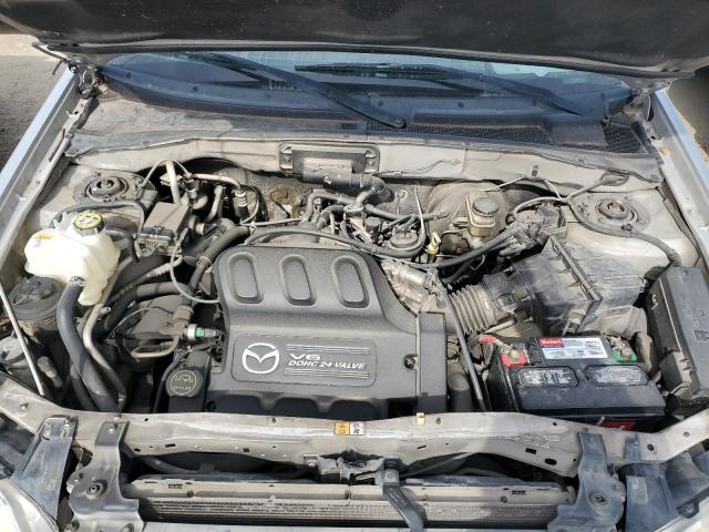 Photo 11 from auction – 2004 MAZDA TRIBUTE LX with VIN 4F2YZ04114KM26494