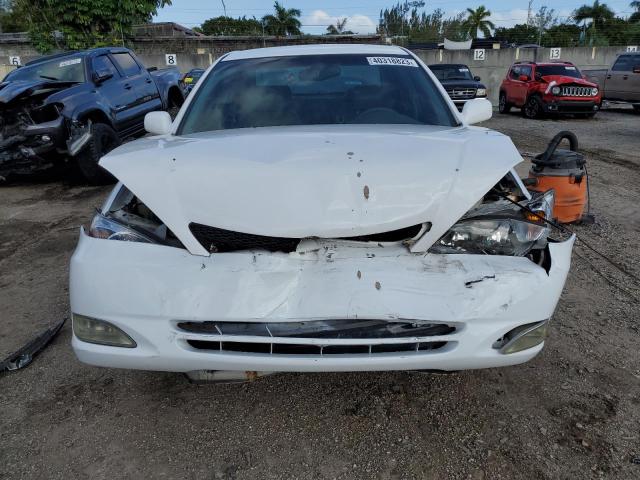 Photo 5 from auction – 2003 TOYOTA CAMRY LE with VIN 4T1BE32K13U257817