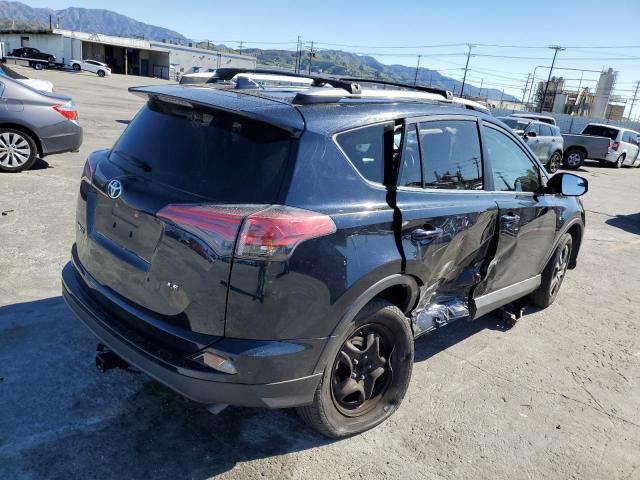 Photo 3 from auction – 2017 TOYOTA RAV4 LE with VIN JTMZFREV2HD099682