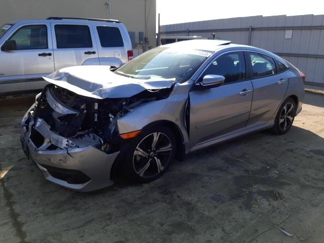 HONDA CIVIC TOUR 2017 with VIN 19XFC1F91HE200482 - Photo from auction