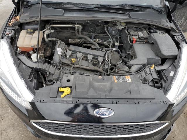 Photo 11 from auction – 2016 FORD FOCUS SE with VIN 1FADP3F23GL265906