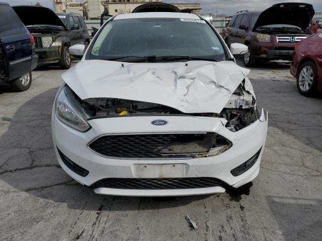 Photo 5 from auction – 2016 FORD FOCUS SE with VIN 1FADP3F22GL369013