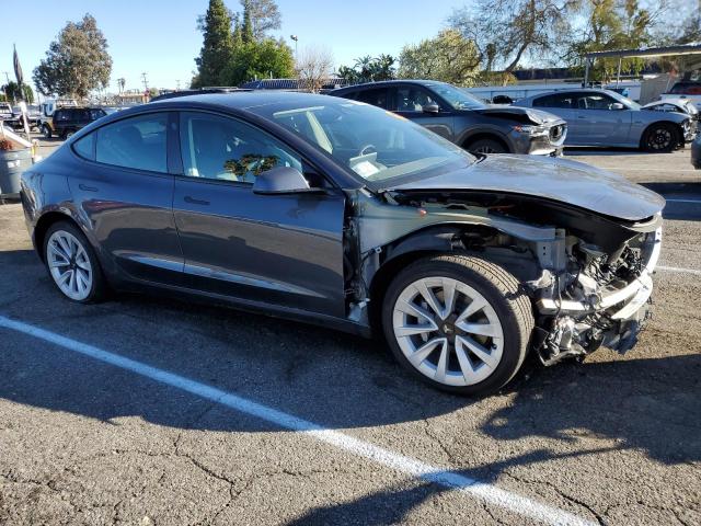 Photo 4 from auction – 2022 TESLA MODEL 3 with VIN 5YJ3E1EA9NF142720
