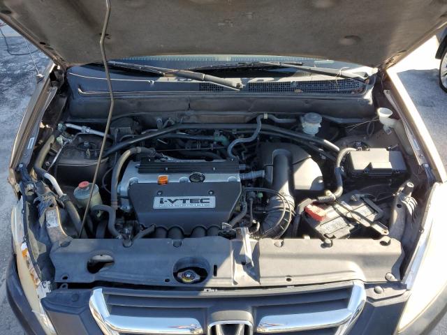 Photo 11 from auction – 2002 HONDA CR-V LX with VIN JHLRD68482C024976
