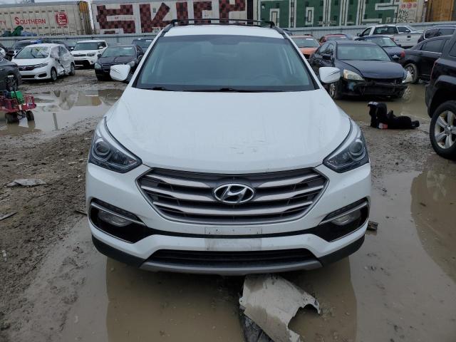 Photo 5 from auction – 2017 HYUNDAI SANTA FE S with VIN 5NMZU3LBXHH013358