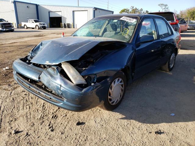 TOYOTA COROLLA VE 2000 with VIN 1NXBR12E5YZ375363 - Photo from auction