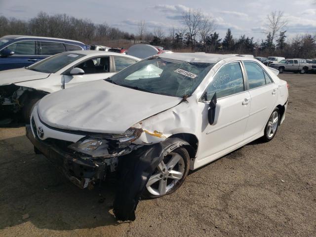 TOYOTA CAMRY L 2014 with VIN 4T1BF1FK2EU402829 - Photo from auction
