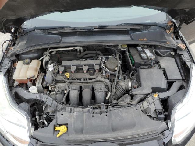 Photo 11 from auction – 2014 FORD FOCUS SE with VIN 1FADP3F24EL449426