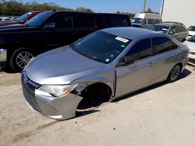 TOYOTA CAMRY LE 2017 with VIN 4T1BF1FKXHU394161 - Photo from auction