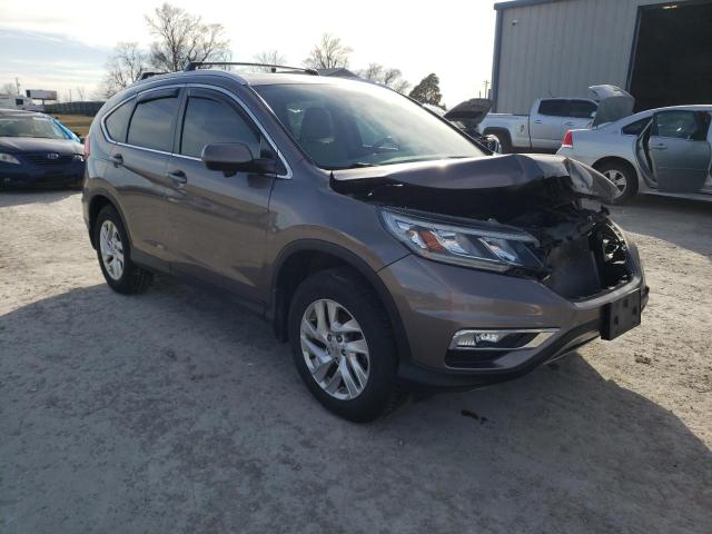 Photo 4 from auction – 2015 HONDA CR-V EXL with VIN 5J6RM4H73FL020569