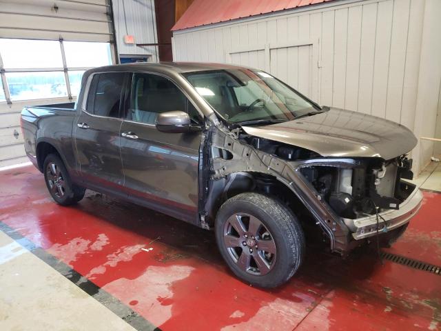 Photo 4 from auction – 2020 HONDA RIDGELINE with VIN 5FPYK3F73LB013793