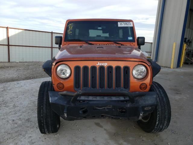 Photo 5 from auction – 2011 JEEP WRANGLER U with VIN 1J4BA3H15BL515818