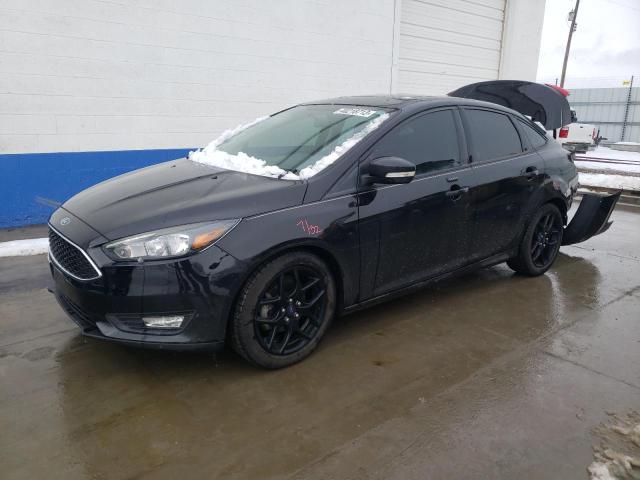 FORD FOCUS SE 2016 with VIN 1FADP3F25GL237203 - Photo from auction