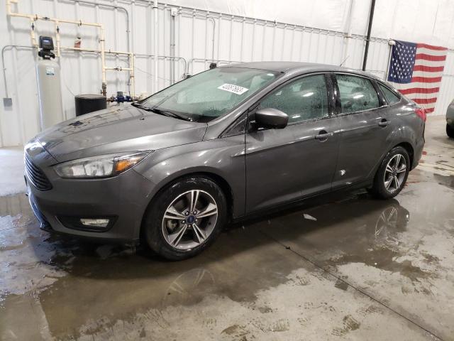 FORD FOCUS SE 2018 with VIN 1FADP3FE2JL289857 - Photo from auction