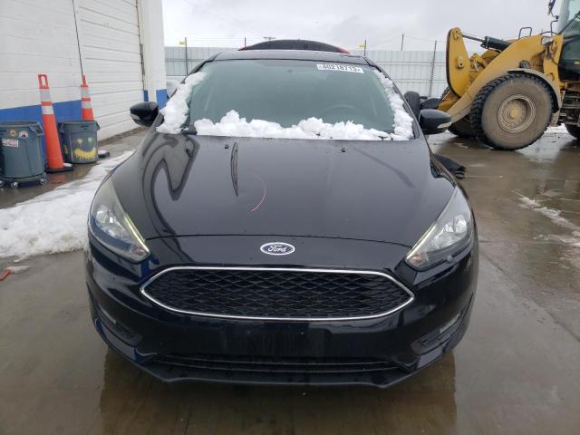 Photo 5 from auction – 2016 FORD FOCUS SE with VIN 1FADP3F25GL237203